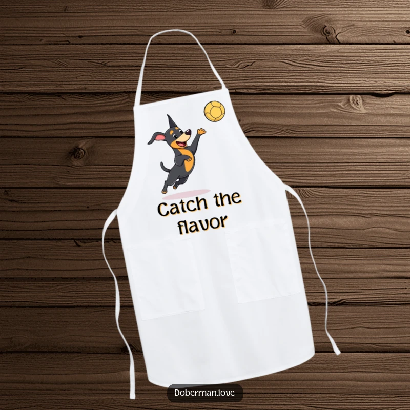 Funny kawaii Doberman apron showing a playful dog leaping to catch a ball, perfect for a humorous and active cook.