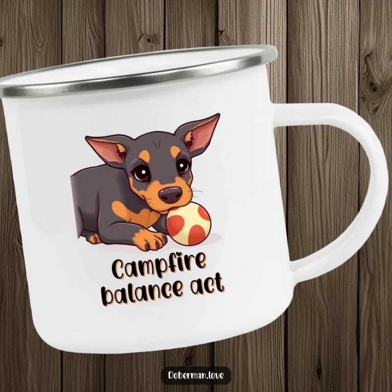 Funny Doberman Camping Mug featuring a kawaii doberman puppy trying to balance a ball on its snout, ready for outdoor challenges.
