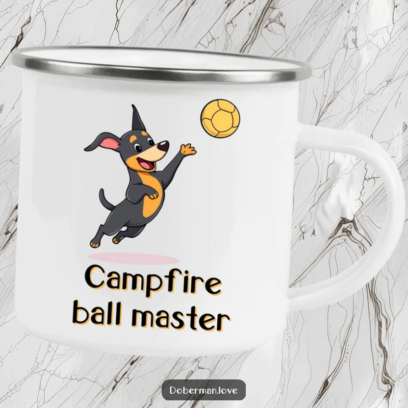 Funny kawaii Doberman camping mug showing a dog playfully leaping to catch a ball, perfect for outdoor fun and humor.