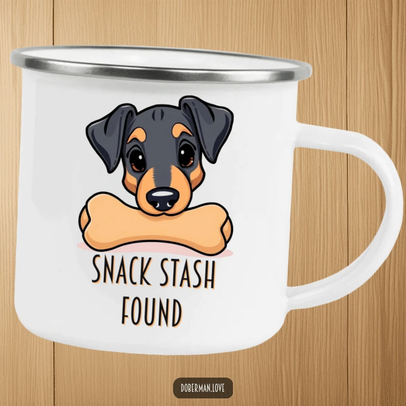 Funny Kawaii Doberman camping mug; a playful pup peeks from behind a chew toy, ready for outdoor fun.