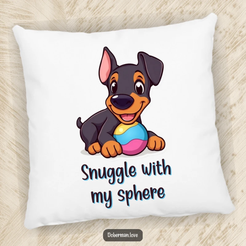 Funny Doberman Pillow: Cheerful dog nudging a colorful toy, a cute and humorous accent pillow.