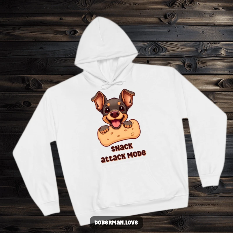 Funny Doberman Puppy Hoodie featuring a cute puppy peeking from a giant dog biscuit. Comfortable and cute, great for dog lovers and chilly weather.
