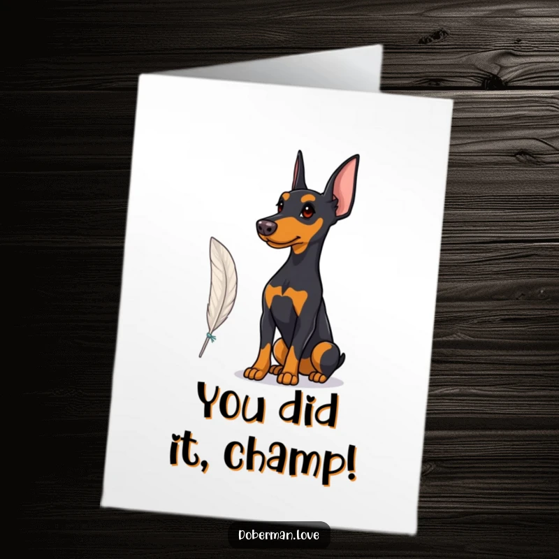 Funny Free Printable Congratulations Card of a proud Doberman intently watching a feather dance in the air.