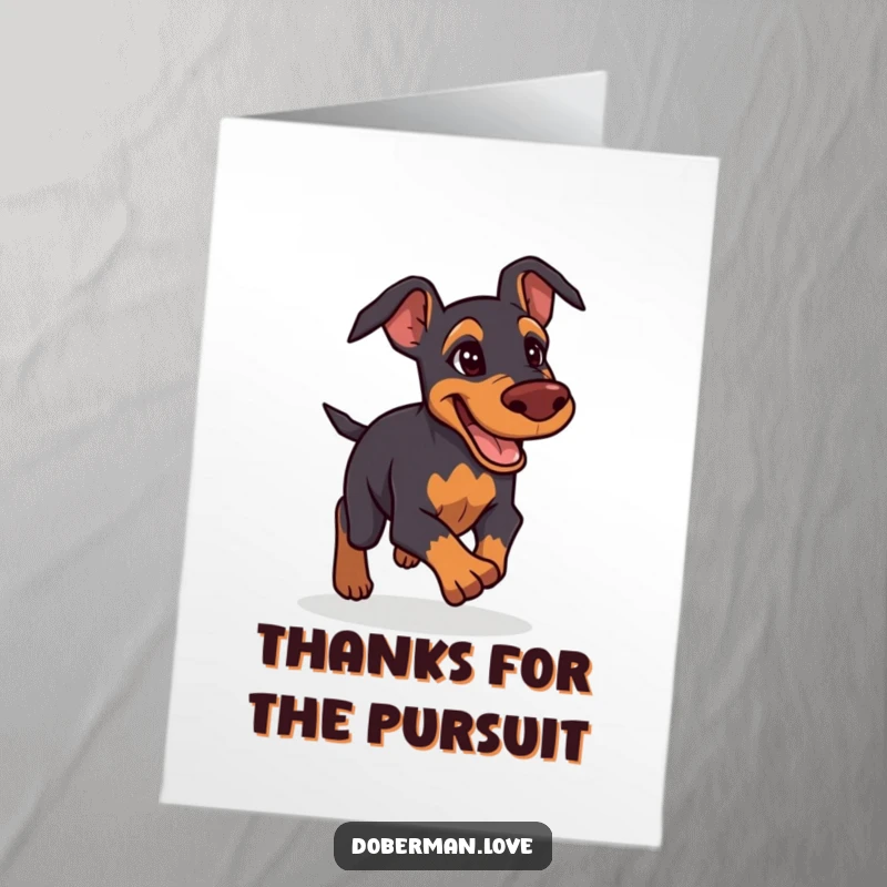 Funny Free Printable Thank You Card: Determined but friendly Doberman giving chase, conveying thanks with gusto.