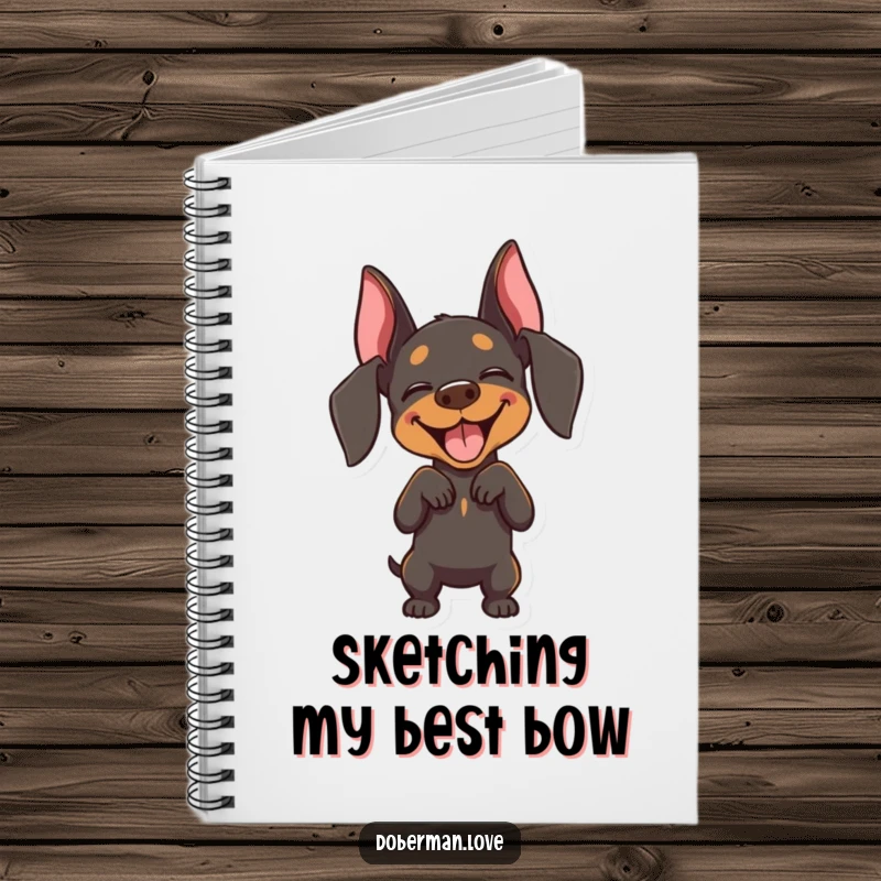 Funny Doberman notebook showing a joyful dog with closed eyes, performing a playful bow, ideal for jotting happy ideas.