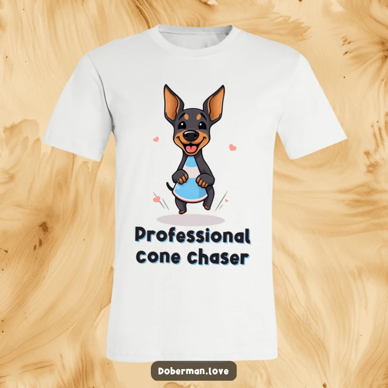 Funny doberman t-shirt showing a giggling dog performing a happy zoomie around a cone, radiating infectious energy and humor.