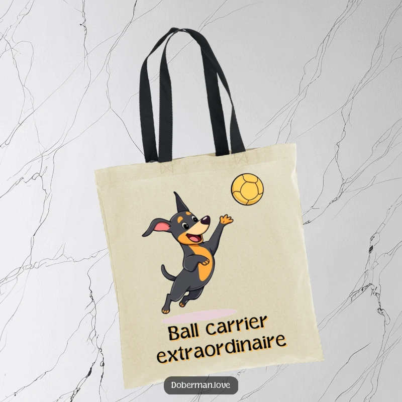 Funny kawaii Doberman tote bag depicting a dog playfully leaping to catch a ball, showcasing active fun and cuteness.