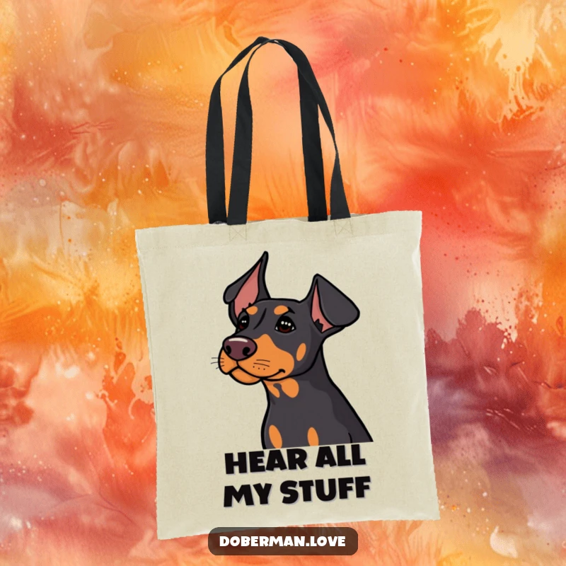 Funny Doberman dog with its ears sharply perked, conveying attentiveness and curiosity on this stylish tote.